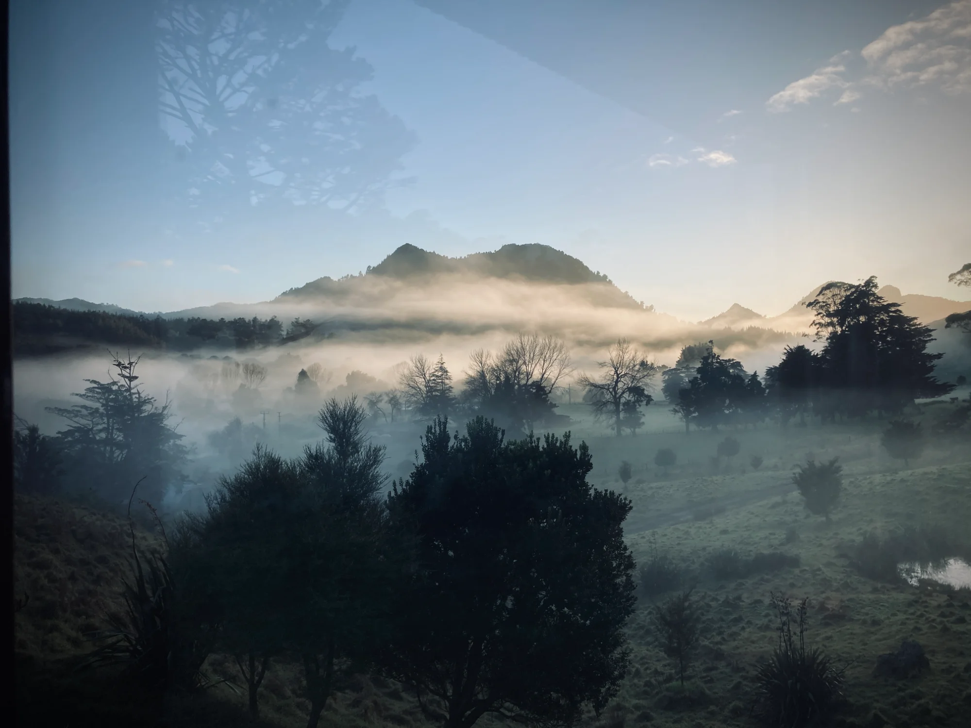 Iron-Clad House - main living space with log burner